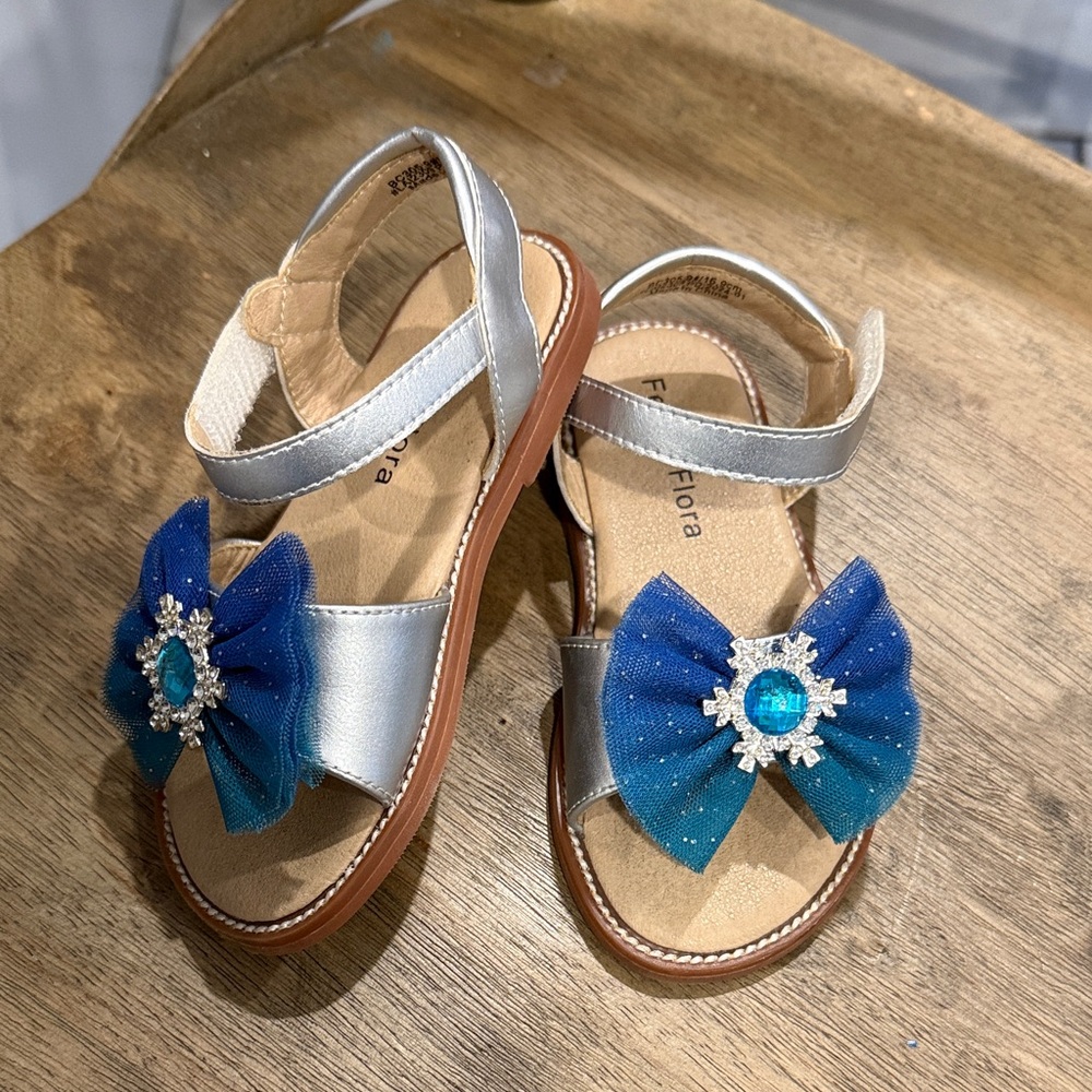 Girls Silver Sandals with Blue Jewel Bow -